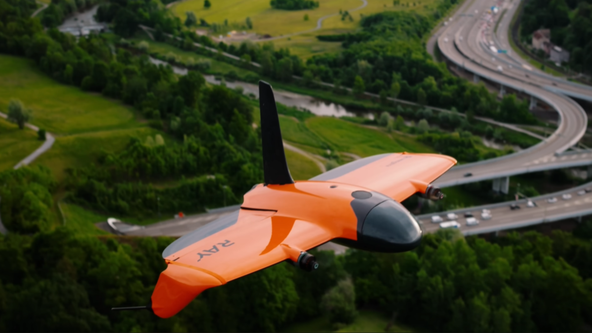 WingtraRay flying in air in learning center page